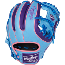 The Rawlings Heart of the Hide 11.5" Color Sync Baseball Glove (PROR314-2CBPU) features blue, purple, and pink colors with bright blue laces and the Rawlings logo on the wrist patch and thumb.