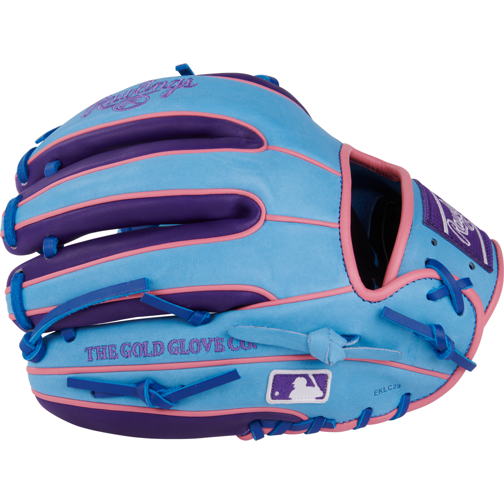 The Rawlings Heart of the Hide 11.5" Color Sync Baseball Glove (PROR314-2CBPU) features blue leather with purple and pink accents, standout stitching, Rawlings branding, “The Gold Glove Co.” text, and an MLB logo on the wrist strap.