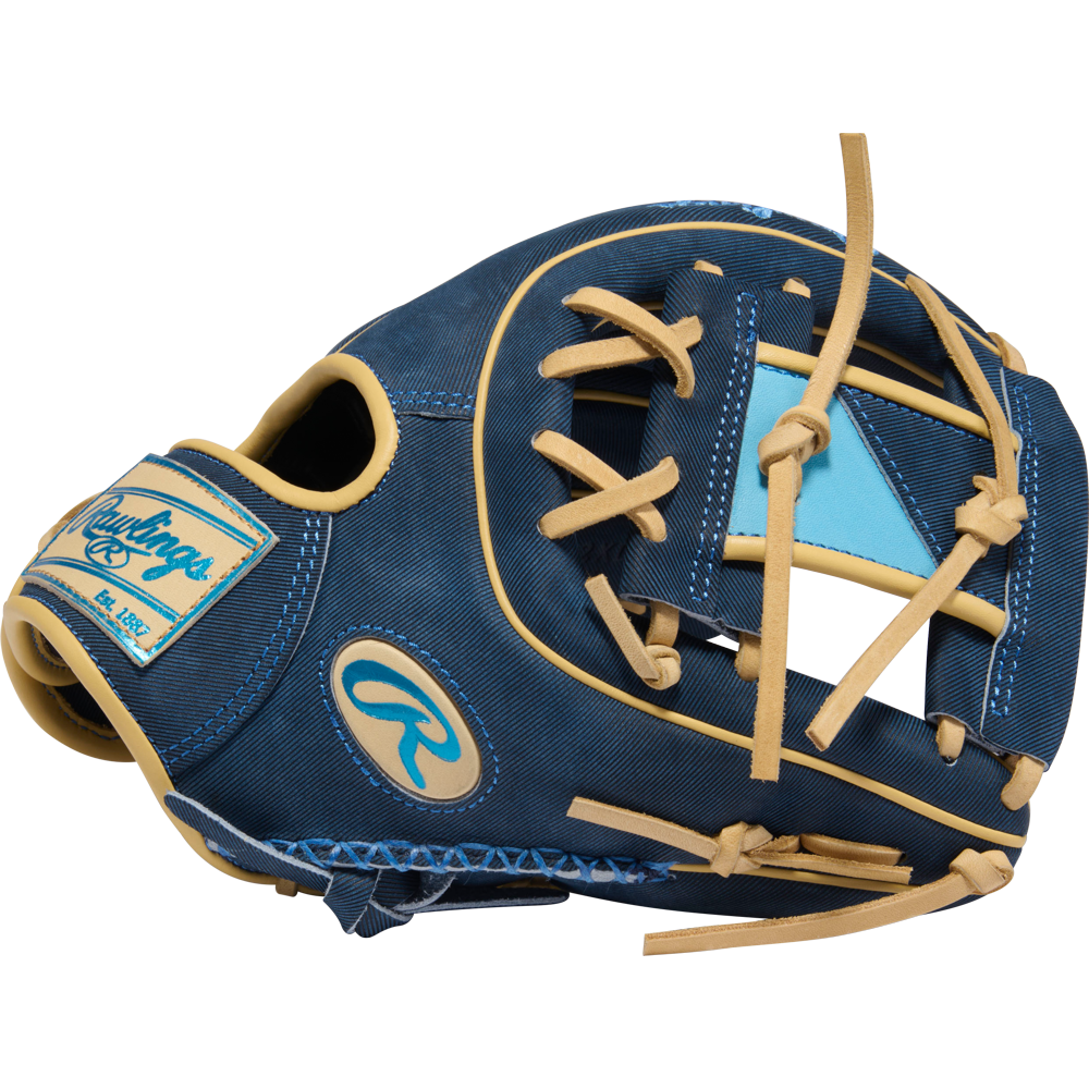 The Rawlings Heart of the Hide 11.5" Baseball Glove (PROR314-2XDN) features tan laces, light blue accents, and a prominent logo patch, shown angled to highlight its webbing.