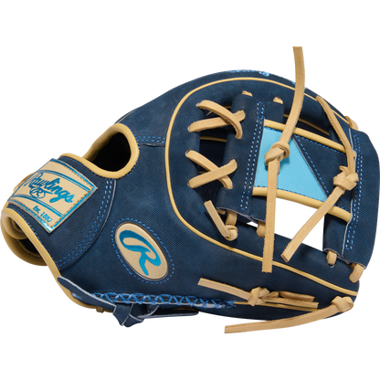 The Rawlings Heart of the Hide 11.5" Baseball Glove (PROR314-2XDN) features tan laces, light blue accents, and a prominent logo patch, shown angled to highlight its webbing.