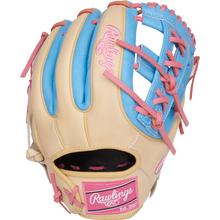 The Rawlings Heart of the Hide 11.5" Baseball Glove (PROR314-32CCB) features tan leather with blue and pink accents, pink laces, a pink Rawlings logo, and “Est. 1887” on the wrist—ideal for infielders.