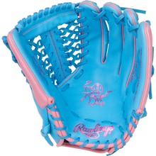 The Rawlings Heart of the Hide 12.75" Baseball Glove (PROR3319-4CB) features a blue and pink design and premium Rawlings craftsmanship.