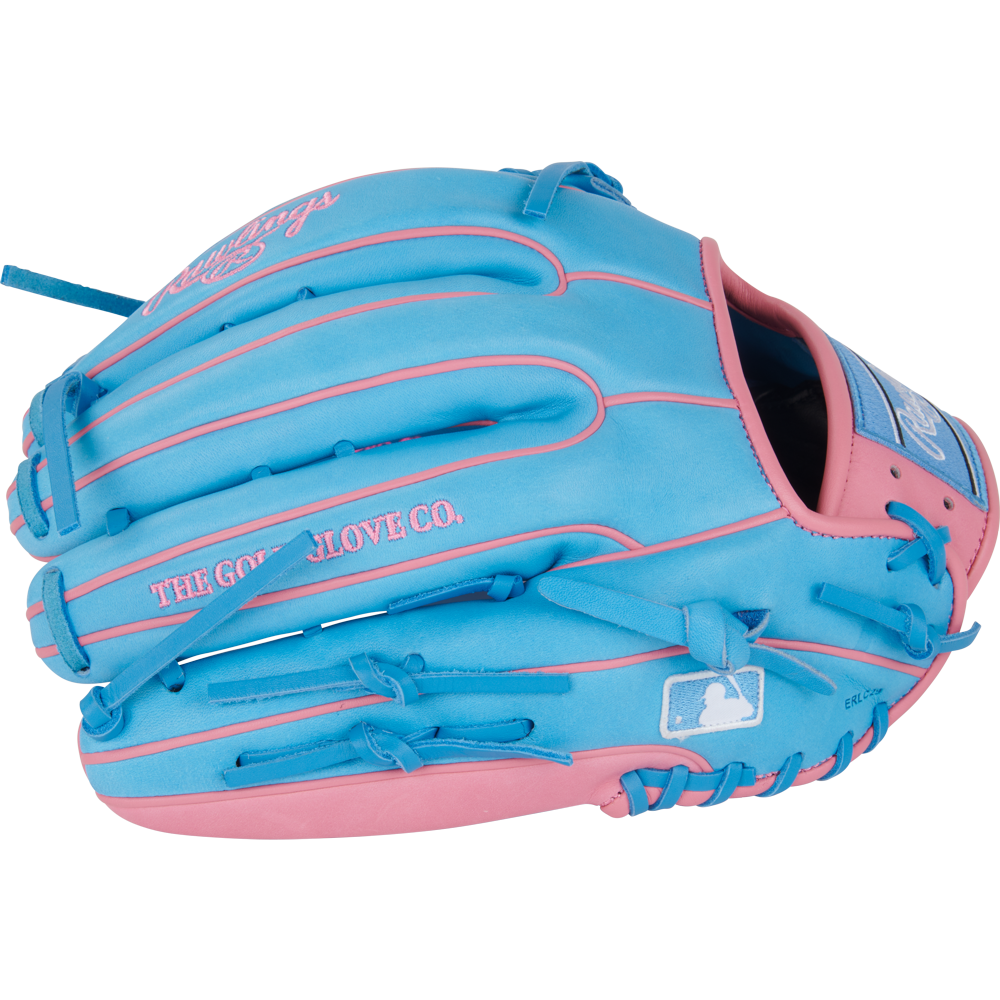 The Rawlings Heart of the Hide 12.75" Baseball Glove (PROR3319-4CB) features bright blue leather, pink accents and stitching, a logo patch, THE GOLD GLOVE CO. text, and a white MLB silhouette on the side.