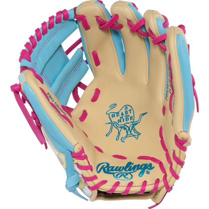 The Rawlings Heart of the Hide Icon Fest 11.5" Baseball Glove (PROR934-2CBE) features tan steerhide leather with blue accents, pink lacing, and displays the iconic Heart of the Hide logo plus Rawlings branding on the palm.