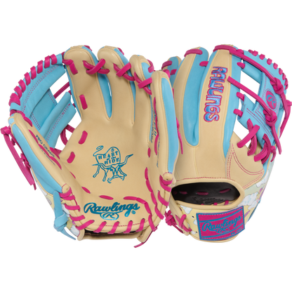 Two tan Rawlings Heart of the Hide Icon Fest 11.5" baseball gloves: one has pink and blue laces with a goat graphic and "GREATEST OF ALL TIME," while the other shows the Rawlings logo; both are made from premium steerhide leather.