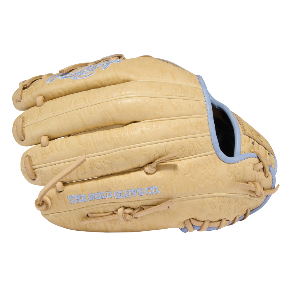 A tan Rawlings Heart of the Hide 11.5″ Baseball Glove (model PRORB734-2XC) features light blue stitching and laces, along with “THE GOLD GLOVE CO.” displayed on the side. Crafted by Rawlings, this glove delivers premium quality and elite performance for infielders.