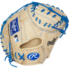 The Rawlings Heart of the Hide 32.5" Baseball Catcher's Mitt (PRORCM325U-23C) features blue straps, a secure Contour Fit, and premium on-field performance.