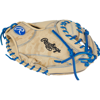 The Rawlings Heart of the Hide 32.5" Catcher's Mitt (PRORCM325U-23C) features tan leather with blue laces and stitching, Rawlings branding on the wrist and web, and Contour Fit technology, displayed against a plain white background.