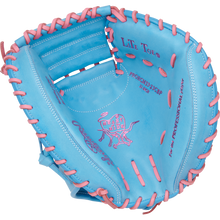 The Rawlings Heart of the Hide 33" Catcher's Mitt (PRORCM33-23CBP) features a blue design with pink lacing and stitching, the iconic Rawlings logo, and detailed text inside the glove.
