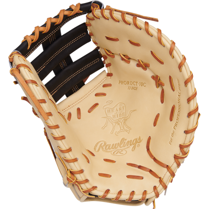 A close-up of the Rawlings Heart of the Hide 13" Baseball First Base Mitt (PRORDCT-10C), showing tan leather, brown lacing, and visible Rawlings branding inside.