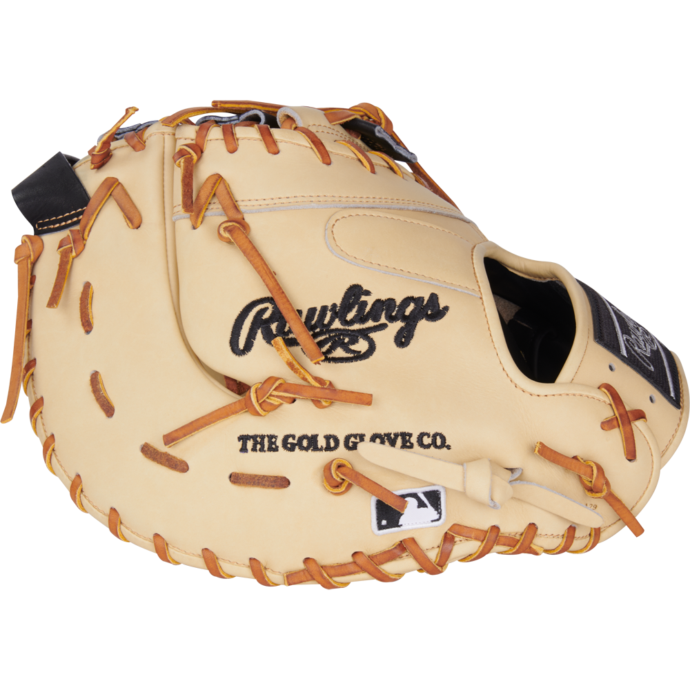 A Rawlings Heart of the Hide 13" Baseball First Base Mitt (PRORDCT-10C) in beige with brown laces, black patch, and THE GOLD GLOVE CO. label on the side is displayed on a white background.
