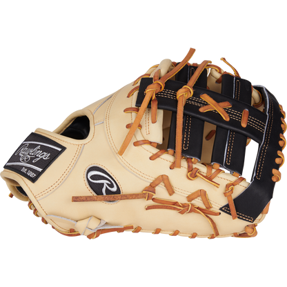 The Rawlings Heart of the Hide 13" First Base Mitt (PRORDCT-10C) features tan and black leather with brown laces and visible stitching, displayed against a white background.