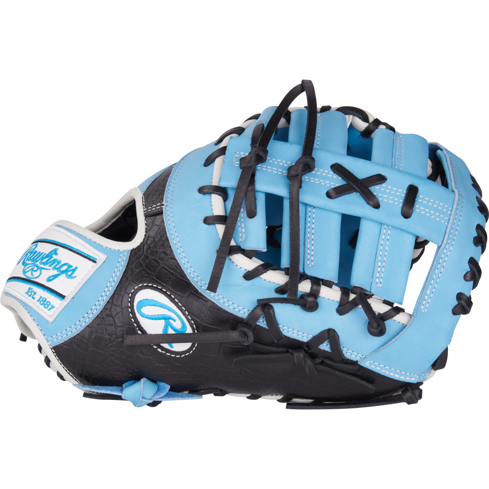 The Rawlings Heart of the Hide 13" First Base Mitt (PRORDCT-10CB) features a blue and black design with black laces, white accents, decorative stitching, and the Rawlings logo.