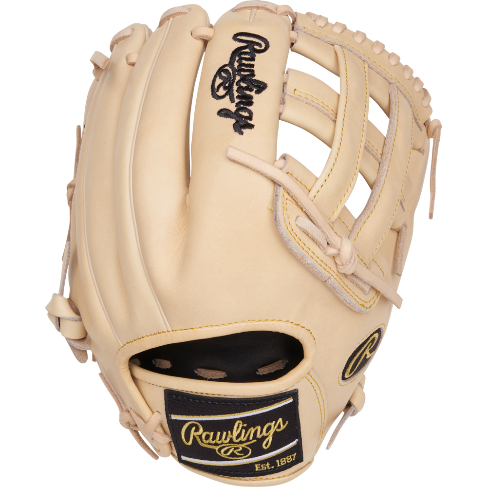 The Rawlings Heart of the Hide 12.25" Baseball Glove (PRORKB17C) features tan leather, black and gold branding on the wrist strap and back, a partially open web, and tan stitching.