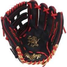 A black Rawlings Heart of the Hide 12" Nolan Arenado Game Model glove (PRORNA28N) with red lacing, gold stitching, and “Heart of the Hide” and “Rawlings” logos on the palm. The open glove displays its interior details.