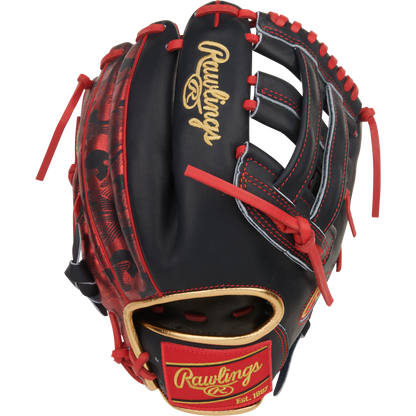 The Rawlings Heart of the Hide 12" Nolan Arenado Game Model (PRORNA28N) is a black and red glove with gold lettering, red stitching and laces, a camo thumb pattern, and a Rawlings logo patch near the wrist.