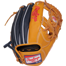 The Rawlings Heart of the Hide 11.5" Baseball Glove (PRORNP4-2TN) features a tan and black design, red stitching, white lacing, Pro-I web, and Rawlings logos on the thumb and wrist strap, shown on a white background.
