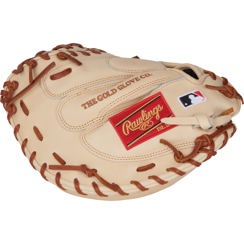 A tan Rawlings Heart of the Hide 34" Yadier Molina catcher's mitt (PRORYM4C) with brown lacing, red Rawlings logo patch, MLB logo patch, and THE GOLD GLOVE CO. stamped on the leather.