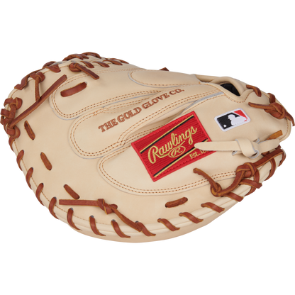 A tan Rawlings Heart of the Hide 34" Yadier Molina catcher's mitt (PRORYM4C) with brown lacing, red Rawlings logo patch, MLB logo patch, and THE GOLD GLOVE CO. stamped on the leather.