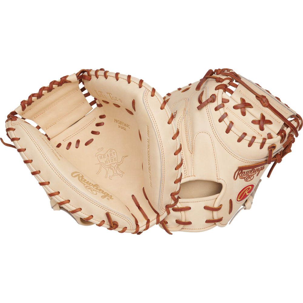 The Rawlings Heart of the Hide 34" Yadier Molina Catcher's Mitt (PRORYM4C) is shown open, highlighting its tan and brown premium leather, detailed lacing, intricate stitching, and embossed branding.