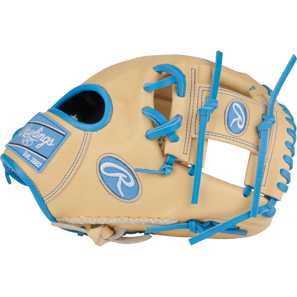 The Rawlings Pro Preferred 11.5" Baseball Glove (PROS204-2CCB) is tan kip leather with blue laces and stitching, a Rawlings logo, and a "Rawlings Est. 1887" patch on the strap.