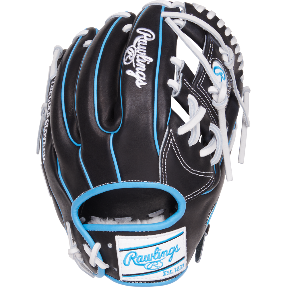 The Rawlings Pro Preferred 11.5" Baseball Glove (PROS934-2BW) features black premium kip leather, white laces, light blue trim, and the iconic Rawlings logo with an Est. 1887 patch on the wrist strap—perfect for elite infielders.