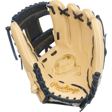 The Rawlings Pro Preferred 11.5" Anthony Volpe Game Model Baseball Glove (PROSAV11) boasts tan and black leather, gold-embossed branding on the palm, and sleek black lacing along the edges.