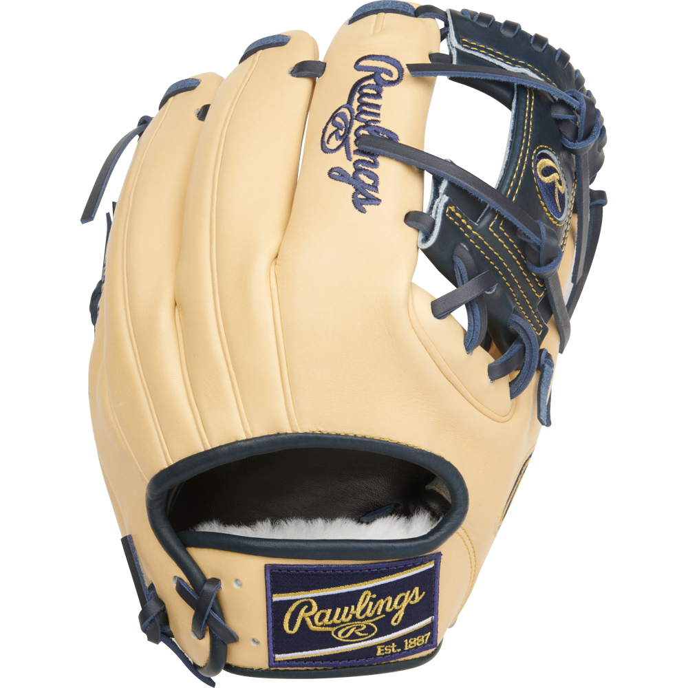The Rawlings Pro Preferred 11.5" Anthony Volpe Game Model Baseball Glove (PROSAV11) features tan and navy leather, detailed stitching, Rawlings branding on the thumb, and a "Rawlings Est. 1887" patch near the wrist opening.