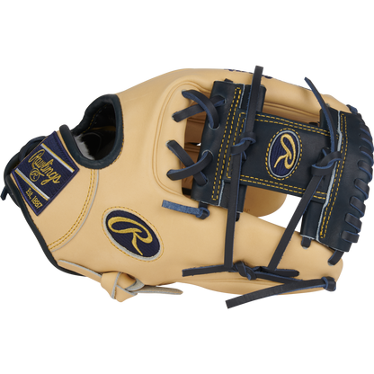 The Rawlings Pro Preferred 11.5" Anthony Volpe Game Model Baseball Glove (PROSAV11) features a tan and black design with yellow stitching, blue laces, and the Rawlings logo on the wrist strap and back.