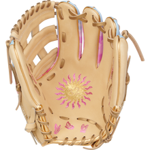 The Rawlings Heart of the Hide 12" Sierra Romero Game Model Fastpitch Glove (PROSR32C) features tan leather, gold and pink sun and butterfly palm designs, light brown laces, and pink inner accents—perfect for infielders.