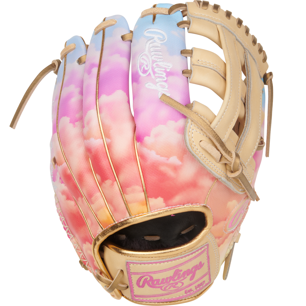 The Rawlings Heart of the Hide 12" Sierra Romero Game Model Fastpitch Glove (PROSR32C) features a pastel sky design with pink and orange clouds, tan laces, and a white embroidered Rawlings logo on the back.