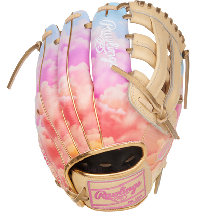 The Rawlings Heart of the Hide 12" Sierra Romero Game Model Fastpitch Glove (PROSR32C) features a pastel sky design with pink and orange clouds, tan laces, and a white embroidered Rawlings logo on the back.