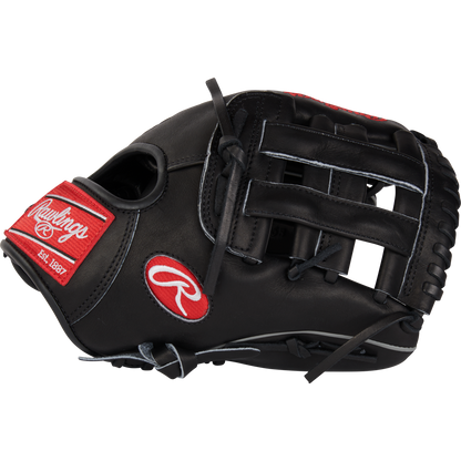The Rawlings Heart of the Hide 11.75" Baseball Glove (RPROT205W-6B) features black leather, red and white logo patches, and lacing. Shown from the side with fingers right, this glove offers a versatile fit and classic style.