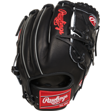 The Rawlings Heart of the Hide 12" Baseball Glove (RPROT206-9B) is black with red and white logos, contrasting stitching, laces, and a wrist patch labeled Rawlings Est. 1887.