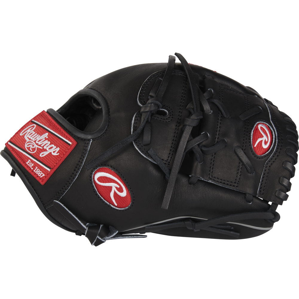 The Rawlings Heart of the Hide 12" Baseball Glove (RPROT206-9B) features a black design with red and white logos, black laces, and stitching—ideal for infielders and pitchers. Shown against a plain white background.