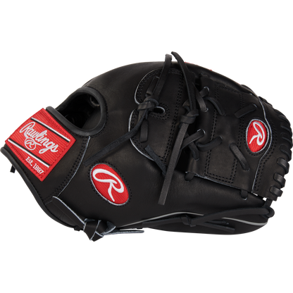 The Rawlings Heart of the Hide 12" Baseball Glove (RPROT206-9B) features a black design with red and white logos, black laces, and stitching—ideal for infielders and pitchers. Shown against a plain white background.