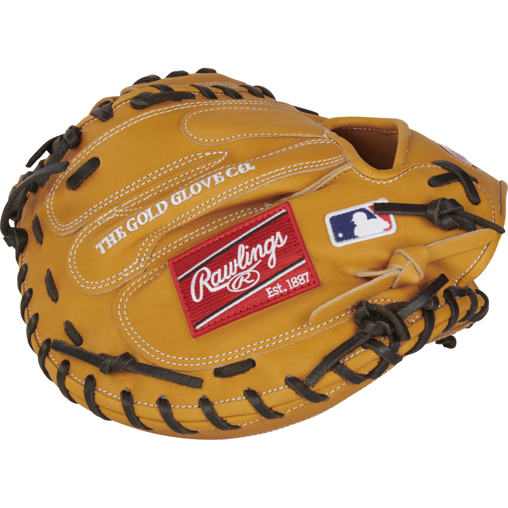 The Rawlings Heart of the Hide 33" Catcher's Mitt (RPROTCM33T) features a tan design with black laces, THE GOLD GLOVE CO. stitching, a red Rawlings patch, and a white MLB logo patch on the outside.