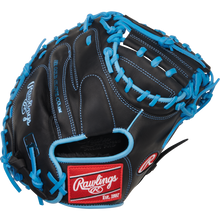The Rawlings R9 32.5" Baseball Catcher's Mitt (R9CM325BCB) is a black youth catcher's mitt with bright blue laces, white stitching, an open web design, and a red and white Rawlings logo patch near the wrist.