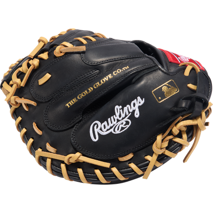 The Rawlings R9 32" ContoUR Baseball Catcher's Mitt (R9CMU-23BC) features a black design with tan laces, white Rawlings and THE GOLD GLOVE CO. stitching, and an MLB logo patch—ideal for youth catchers.