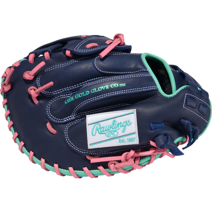 The Rawlings R9 33" Fastpitch Catcher's Mitt (R9SBCM33-24NMP) features blue leather, pink laces, mint green accents, and teal Rawlings/The Gold Glove Co. embroidery—a standout mitt perfect for softball catchers.