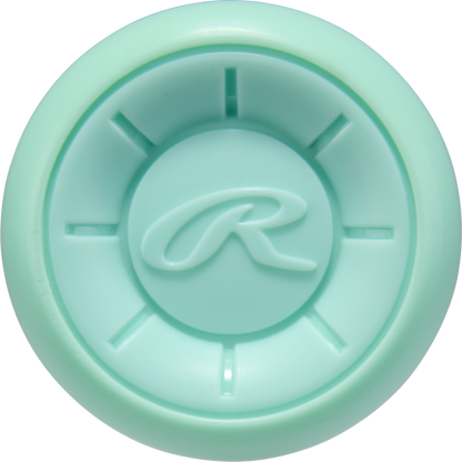 A round, light teal object with indented lines radiating from the center and a raised script R in the middle, resembling the end cap of the 2026 Rawlings Icon (-3) BBCOR Baseball Bat: RBB6I3 (DEMO).