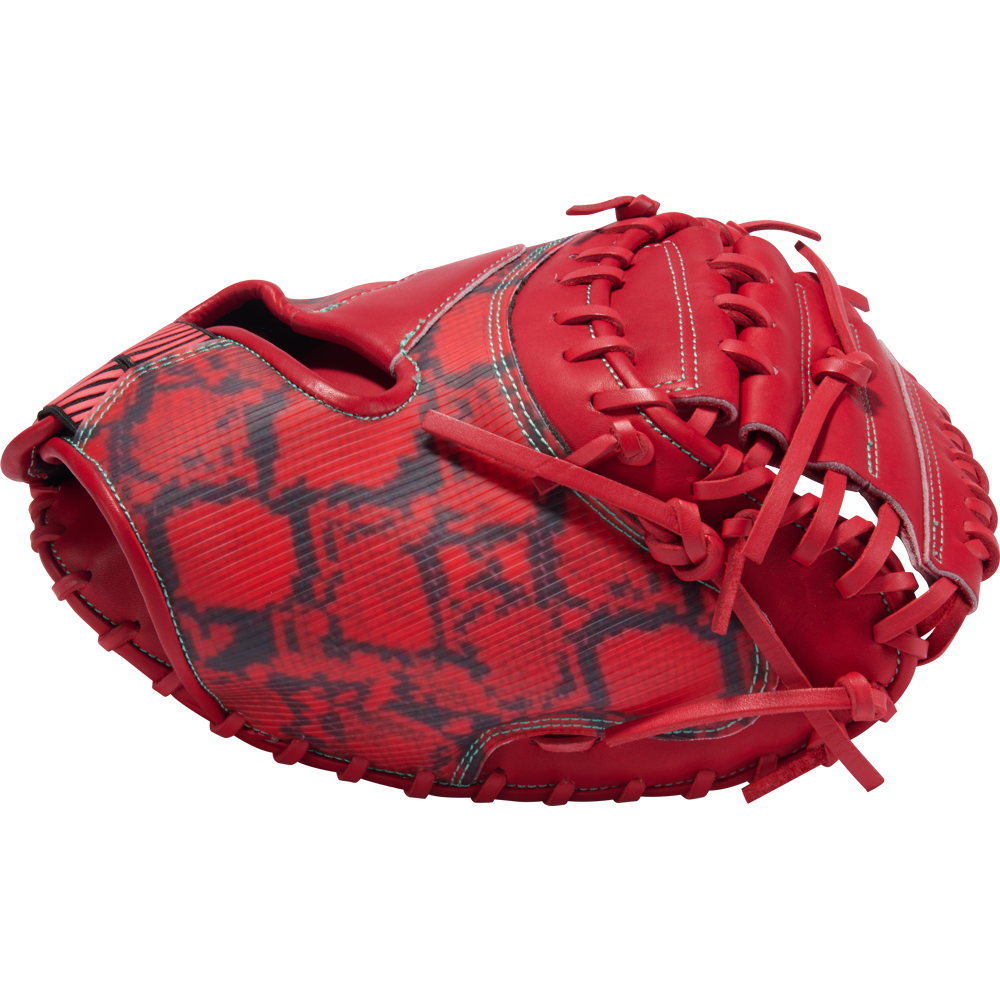 The Rawlings REV1X 34″ Baseball Catcher’s Mitt: REVCM43-23S showcases a bold red and black snakeskin-inspired design, highlighted by detailed stitching and prominent edge lacing—delivering striking style and pro-level performance from Rawlings.
