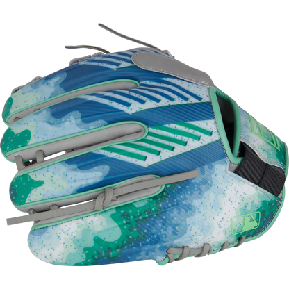 The Rawlings REV1X 11.5" Francisco Lindor GM Baseball Glove (RREVFL12G) sports blue, green, and turquoise abstract patterns, gray laces, a speckled modern design, and a small MLB logo near the wrist.