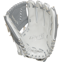 The Rawlings Liberty Advanced 12" Fastpitch Softball Glove (RRLA120-31WSS) features a white and silver design, grey lacing, "Liberty Advanced" on the palm, detailed stitching, and a webbed pocket—ideal for pitcher/infield positions.