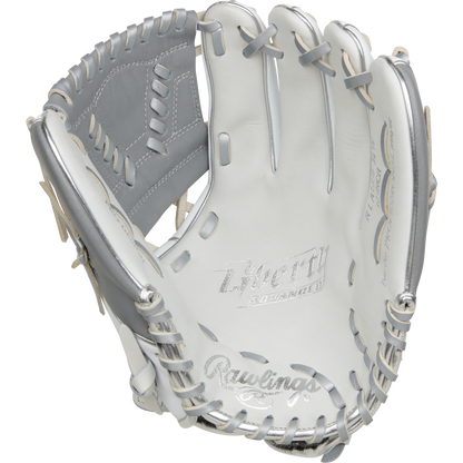 The Rawlings Liberty Advanced 12" Fastpitch Softball Glove (RRLA120-31WSS) features a white and silver design, grey lacing, "Liberty Advanced" on the palm, detailed stitching, and a webbed pocket—ideal for pitcher/infield positions.