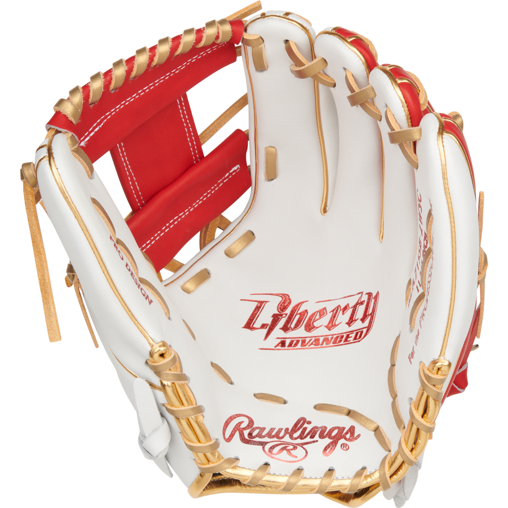 A Rawlings Liberty Advanced Color Sync 11.75" Fastpitch Softball Glove (RLA715SB-2WSG) in white and red with tan laces is open, displaying its palm and signature Rawlings branding inside.