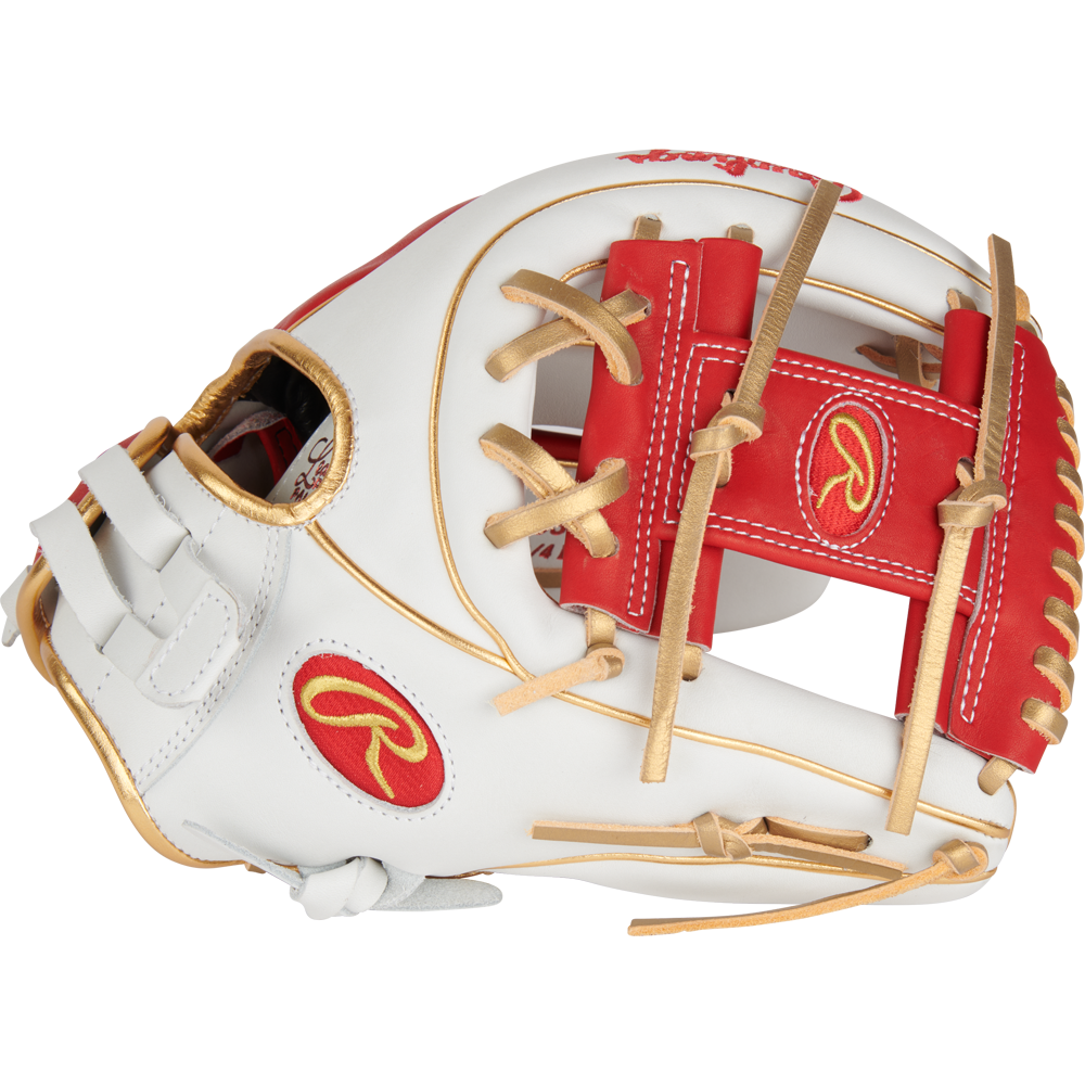 The Rawlings Liberty Advanced Color Sync 11.75" Fastpitch Softball Glove (RLA715SB-2WSG) features a white design with red and gold accents, tan laces, and the Rawlings logo in red and gold on the thumb and wrist.