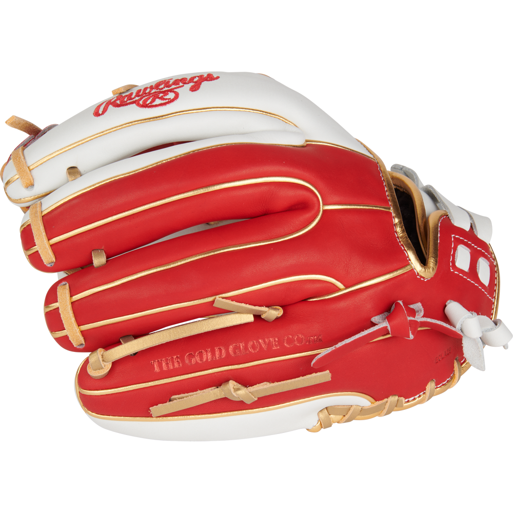 A red and white Rawlings Liberty Advanced Color Sync 11.75" fastpitch softball glove (RLA715SB-2WSG) with tan lacing, featuring The Gold Glove Co. embossed on the side.