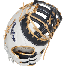 A close-up of the Rawlings Liberty Advanced Color Sync 13" Fastpitch First Base Mitt (RLADCTSBWNG) shows its white and dark navy design with tan laces, open web, and the Rawlings logo embroidered on the side.