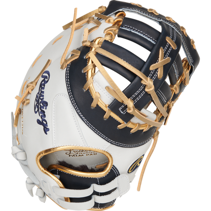 A close-up of the Rawlings Liberty Advanced Color Sync 13" Fastpitch First Base Mitt (RLADCTSBWNG) shows its white and dark navy design with tan laces, open web, and the Rawlings logo embroidered on the side.
